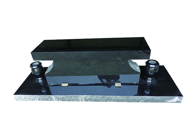 Black pedestal bench with vase